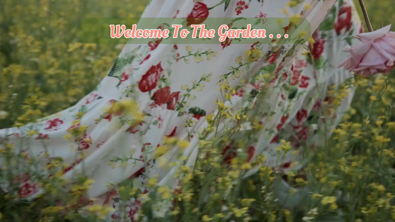 Load video: Blissful slow walk through tall flowers in a flowery dress